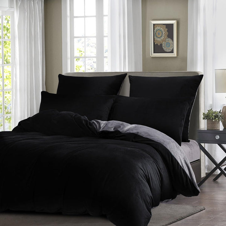 black sheets on bed