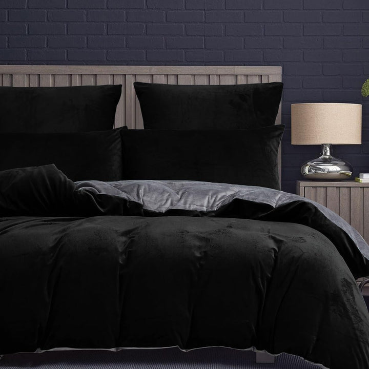 black sheets on bed